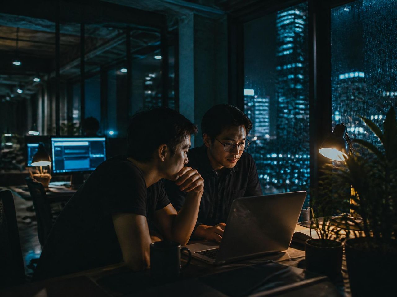Softsincs engineering team collaborating in a modern office
